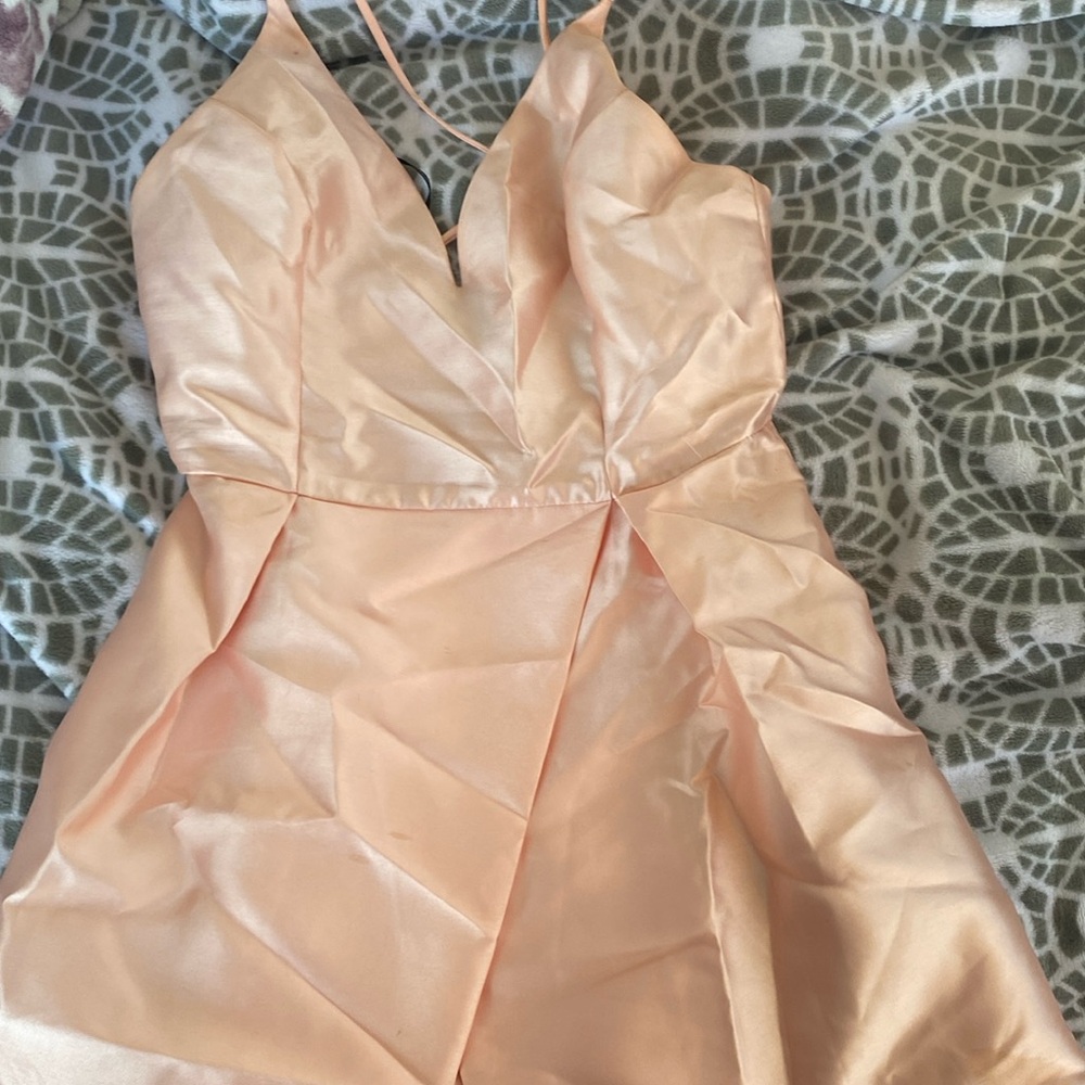 Light pink pleated dress with cross back straps